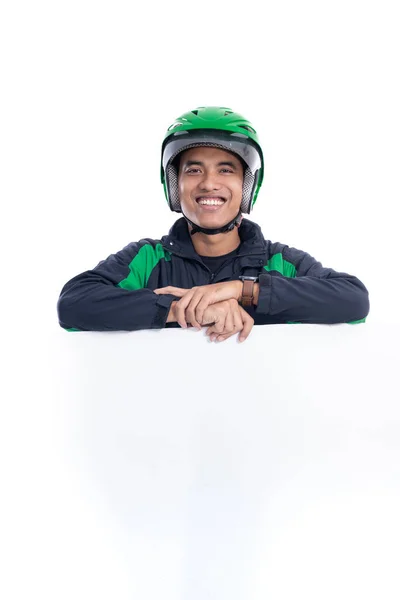 Uber rider with helmet holding blank white board — Stock Photo, Image