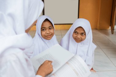 a portrait of a student having a together studying