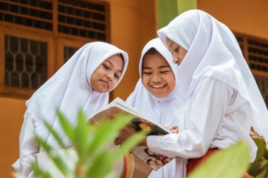 islamic school students studying together