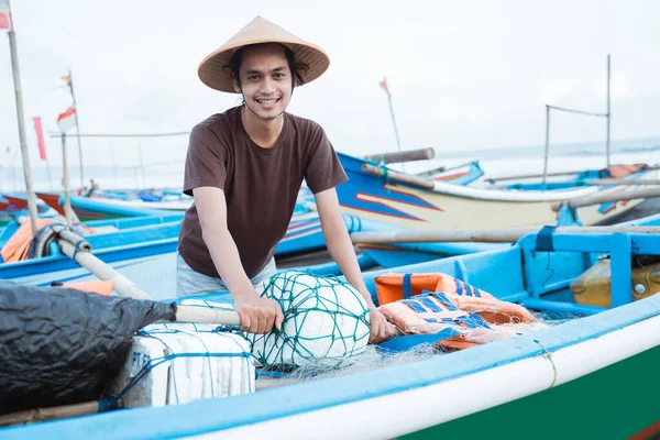 Portrait of a young male fisherman — Stock Photo, Image