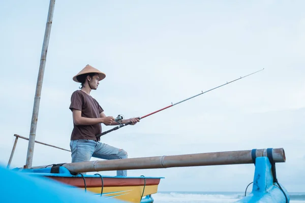 Portrait of a young fisherman — Stock Photo, Image