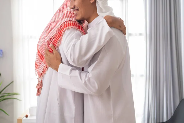 Moslim zakenpartner bespreken en ontmoeten met laptop — Stockfoto