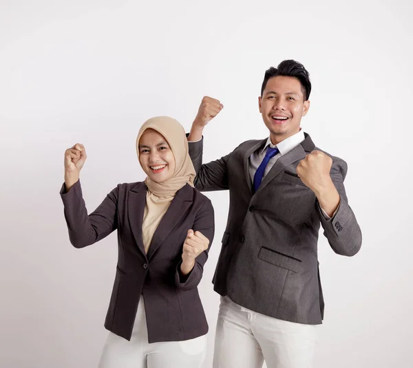 Two young couples business very excited working looking at the camera — Stock Photo, Image