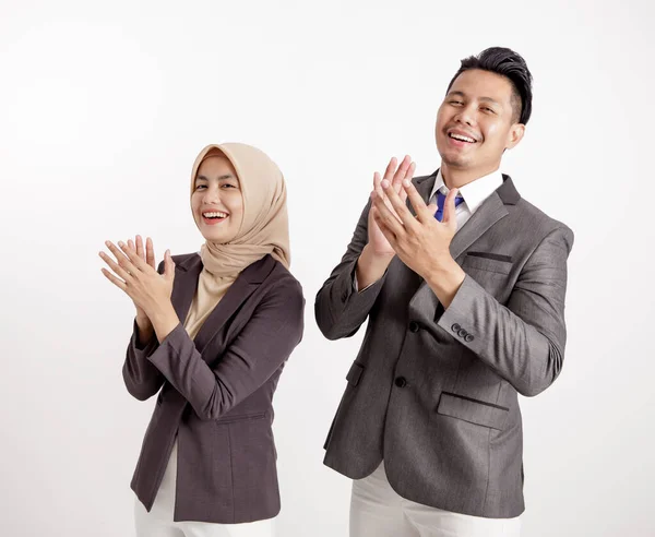 Two young business colleagues very excited give applause to someone — Stock Photo, Image