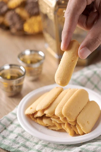 Kue lidah kucing or katte tong biscuit. islamic cookies biscuit for eid mubarak — Stock Photo, Image
