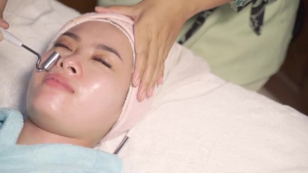Young woman feel relax having facial treatment — Video Stock