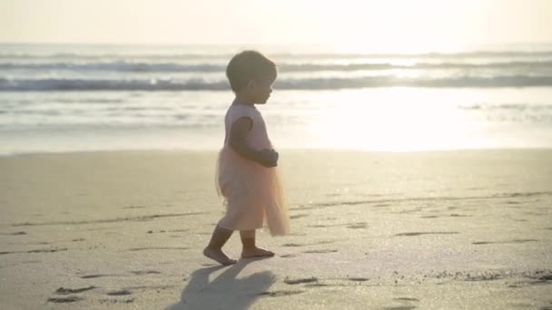 Little toddler enjoy playing with sand — Stock Video