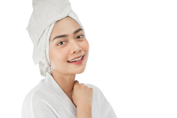 Asian beautiful girl with bath towel on head with hands beside neck with copy space — Stock Photo, Image