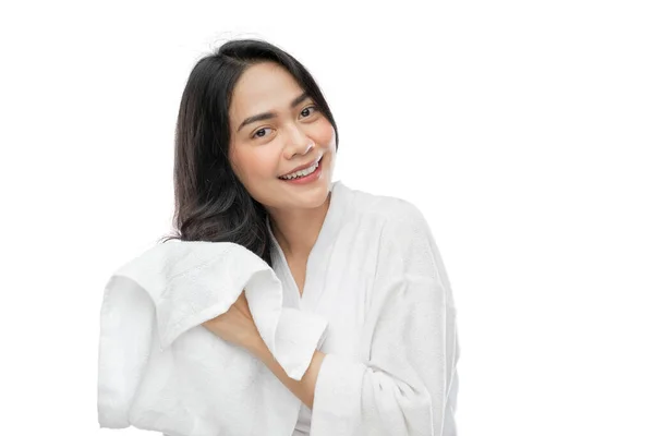 Beautiful woman wearing a towel drying her beautiful long hair with a towel after bathing — Fotografia de Stock