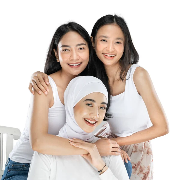 Portrait of three beautiful young women indoor — Stockfoto