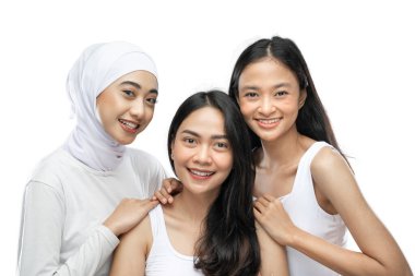 three affectionate woman laughing and smiling