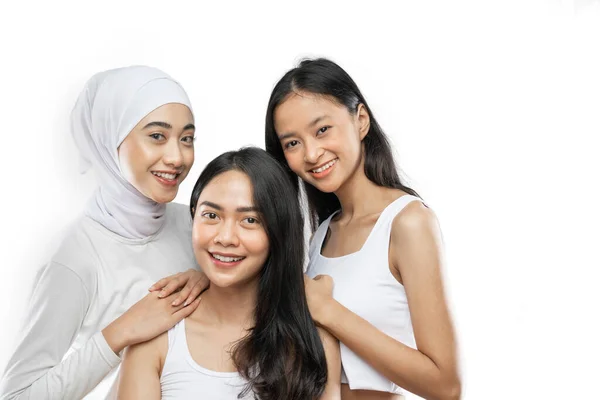 Portrait of three attractive young women indoor — Stock fotografie