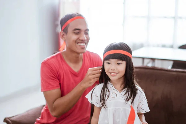 Asian family celebrating indonesian independence day at home — Zdjęcie stockowe