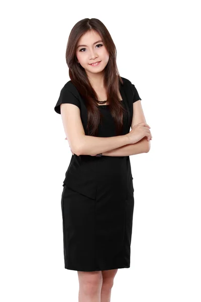 Portrait of a happy young business woman standing with folded ha — Stock Photo, Image