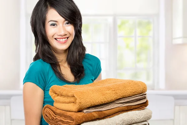 Housewife with laundry — Stock Photo, Image