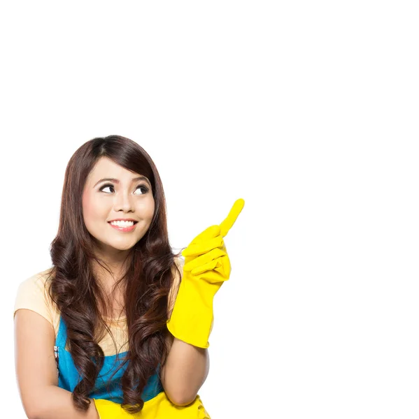 Chica con guantes apuntando hacia arriba —  Fotos de Stock
