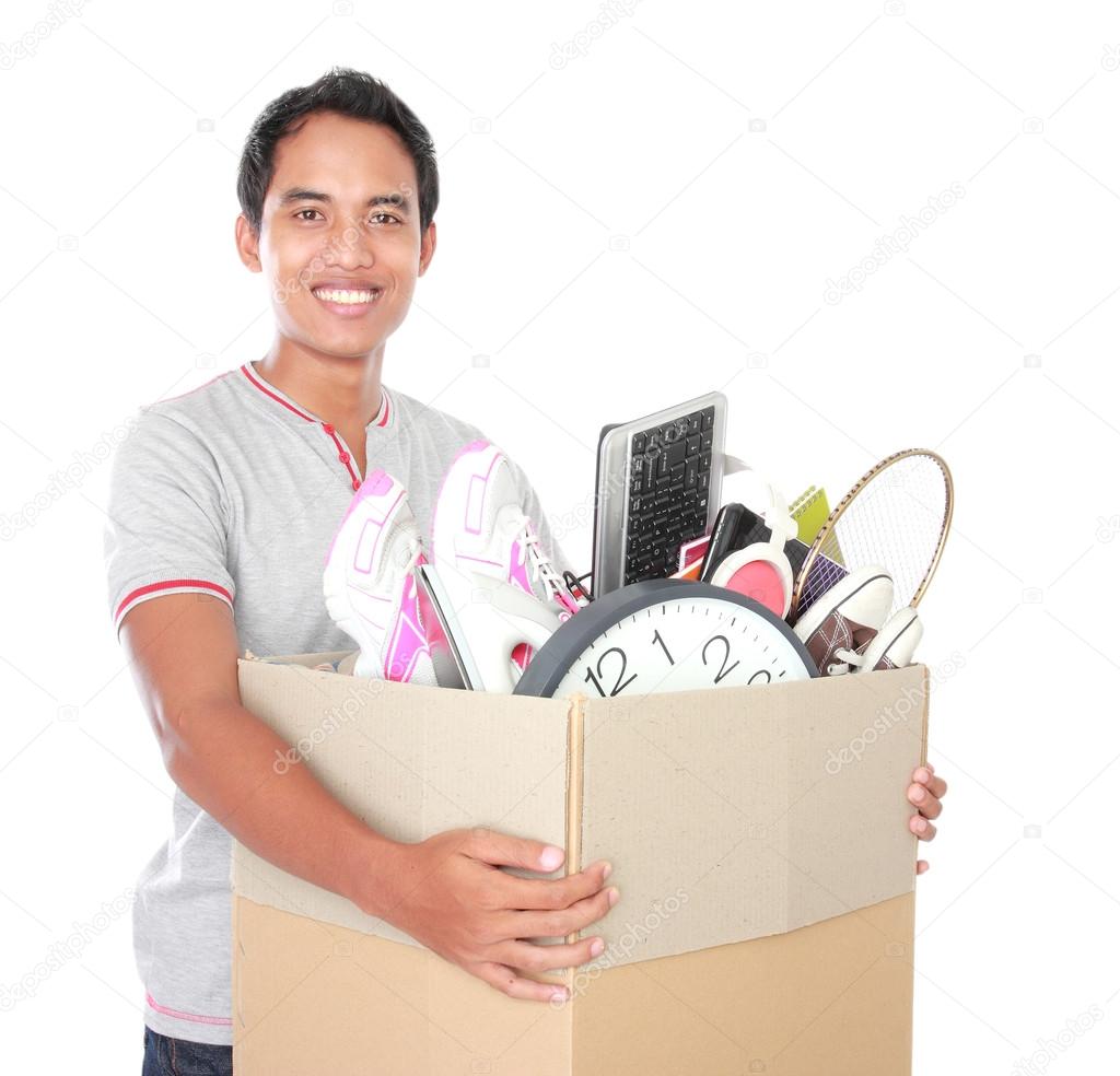 moving day. man with cardboard box