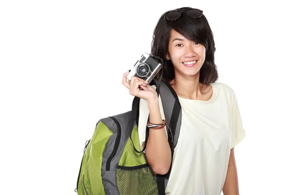 Happy young girl with vintage camera going on vacation — Stock Photo, Image