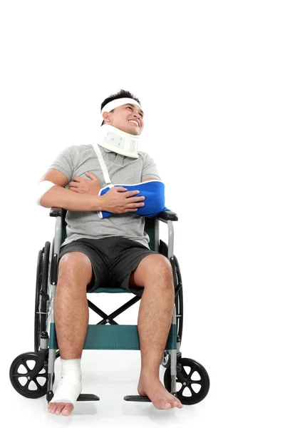 Injured young man in wheelchair — Stock Photo, Image