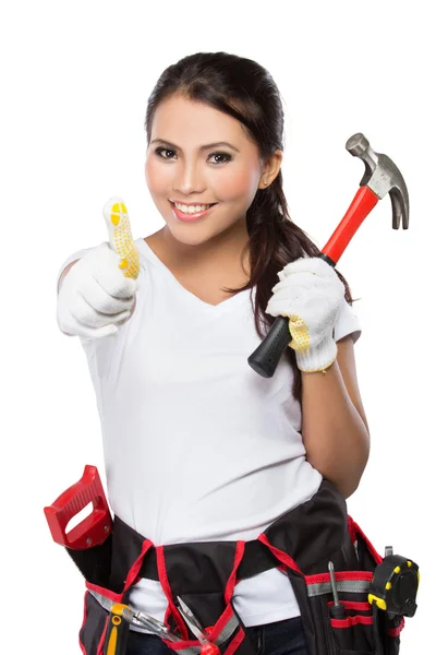Vrouw met gereedschap weergegeven: duim omhoog — Stockfoto