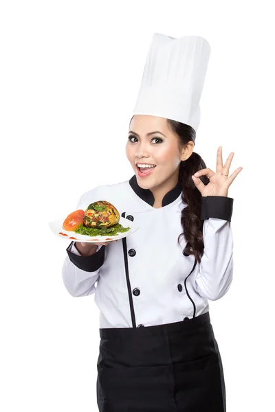 Mujer joven presentando Chef — Foto de Stock