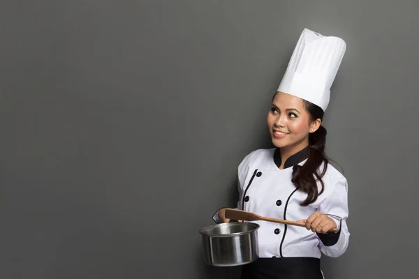 年轻女子厨师思维 — 图库照片