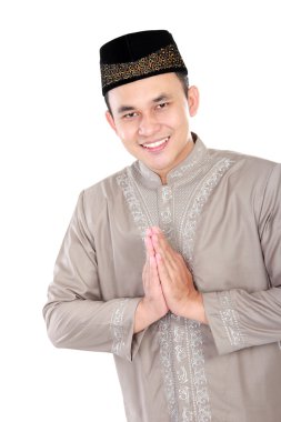 young muslim man smiling clipart