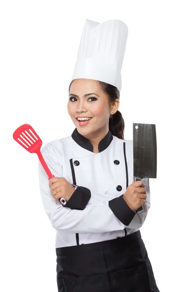 Female chef in a traditional hat and coat — Stock Photo, Image