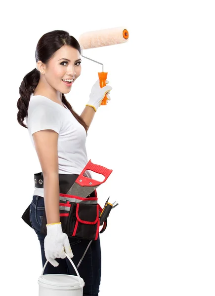 Female construction worker painting — Stock Photo, Image