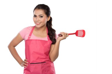 bir spatula tutan mutlu kadın