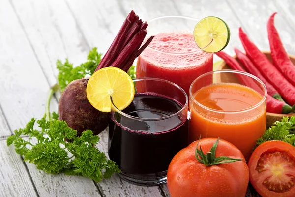 Glasses with fresh vegetable juices — Stock Photo, Image
