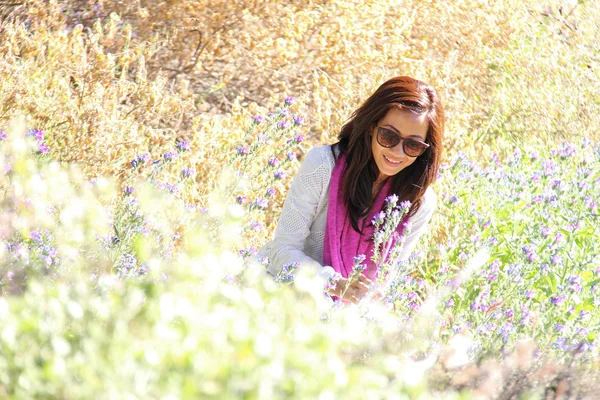 Beautiful woman enjoying lavender — Stock Photo, Image