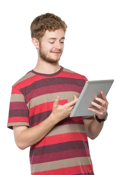 Jovem trabalhando com um tablet PC moderno isolado — Fotografia de Stock