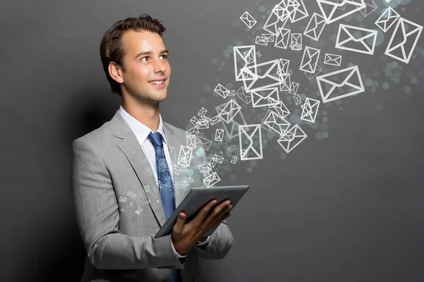 The man with a tablet  isolated — Stock Photo, Image