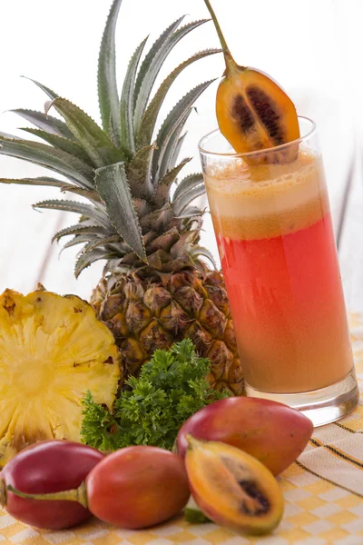 Tamarillo and pineapple mix smoothies — Stock Photo, Image
