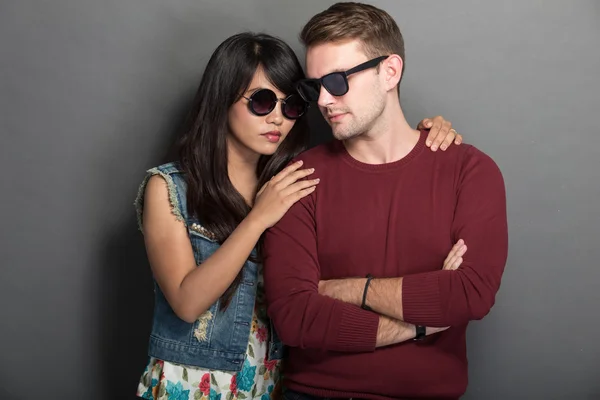 Young happy multicultural couple chic pose — Stock Photo, Image
