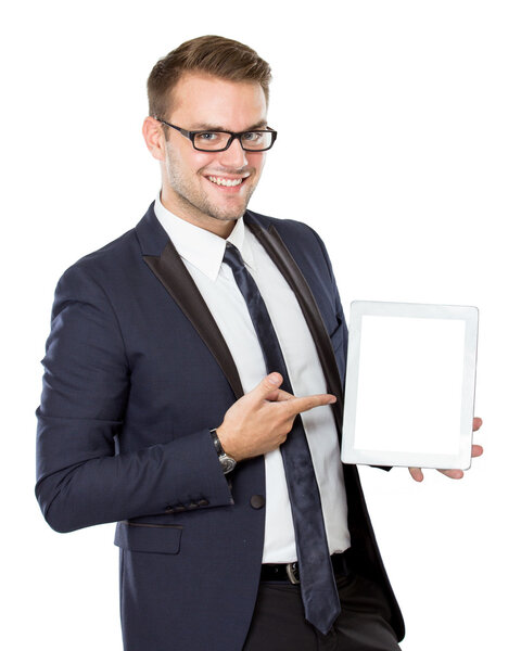 Young businessman with a tablet on his hand
