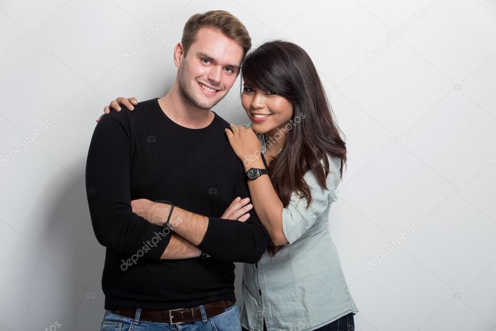 Young happy multicultural couple