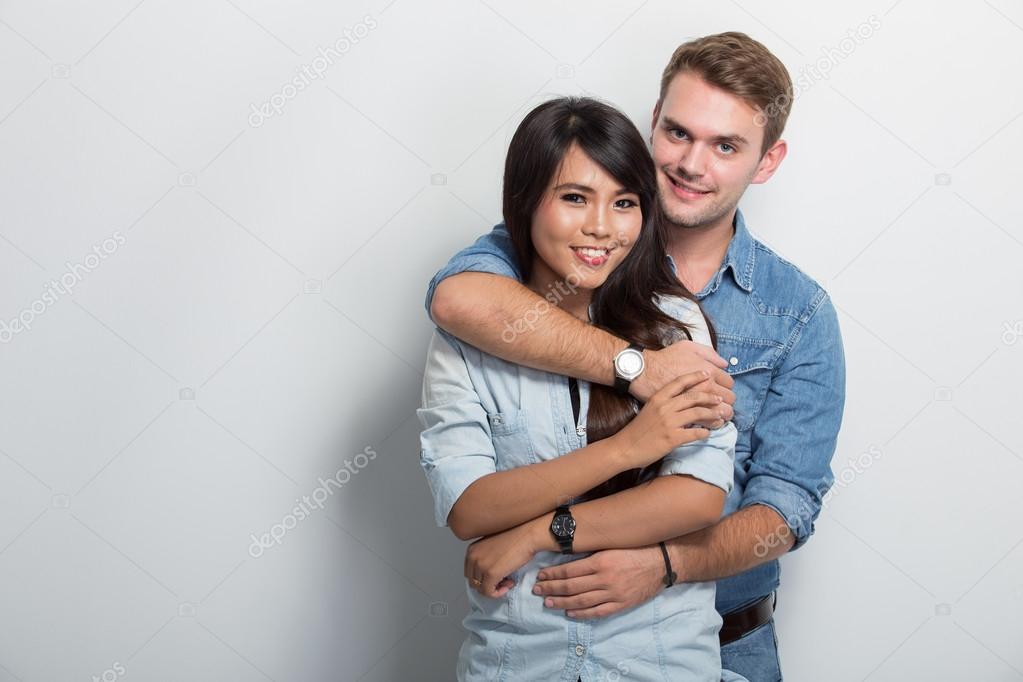 Young happy multicultural couple