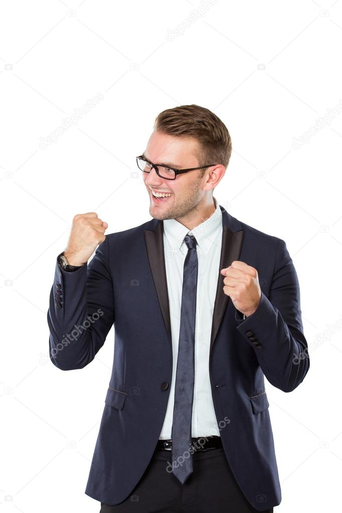 happy young businessman celebrating victory