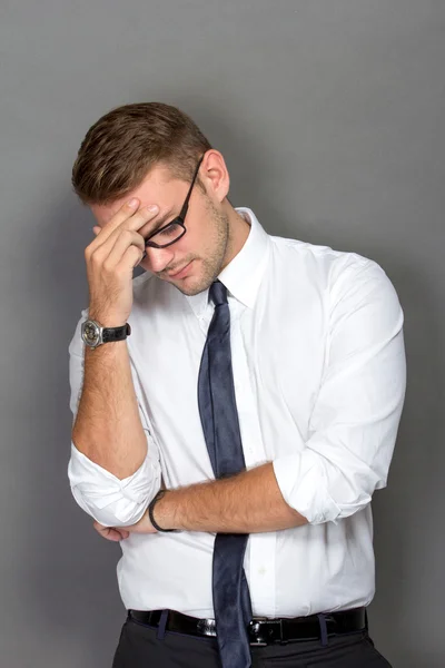 Stressed young businessman — Stock Photo, Image