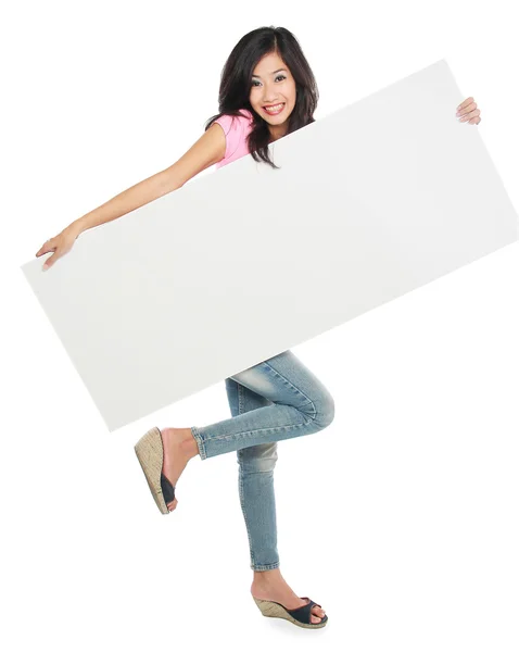 Young beautiful woman holding blank white card — Stock Photo, Image