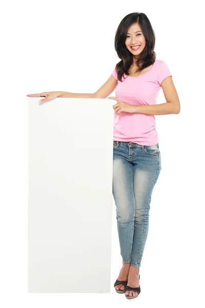 Young beautiful woman holding blank white card — Stock Photo, Image