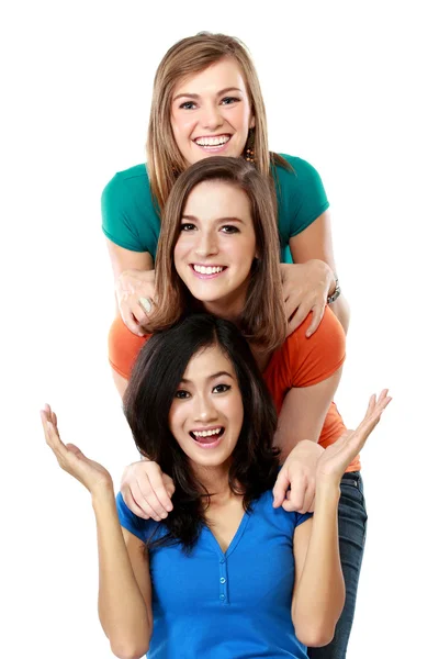 Three happy girls laugh lined up — Stock Photo, Image