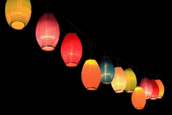 Colorful lanterns in the darkness of night — Stock Photo, Image