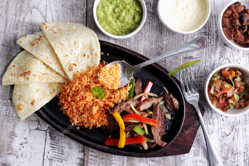 Mexican cuisine fajitas Stock Photo by ©odua 71713603