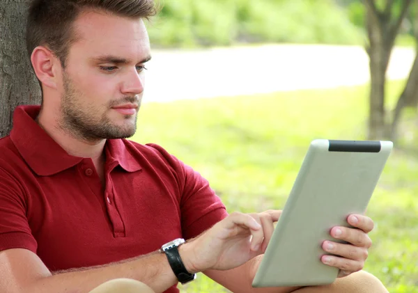 College students playing tablet — Stock Photo, Image