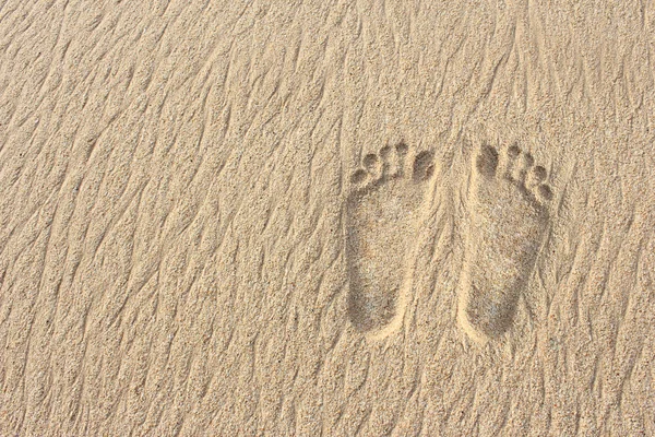 Empreintes de pas sur la plage de sable — Photo