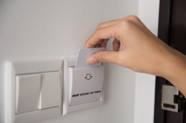 Key Card to activating the electricity in a room hotel clipart