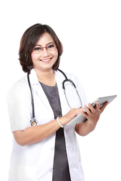 middle aged woman doctor using tablet computer